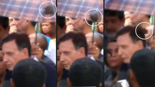 Brasil. Prefeito do Rio culpa população por inundações e é atingido por bola de lama